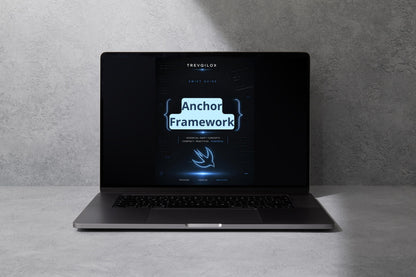 A dark gray open laptop sits on a light gray surface against a textured gray wall. The screen displays a digital graphic with the text 'TREVOLOX' and 'Luma Blueprint'.