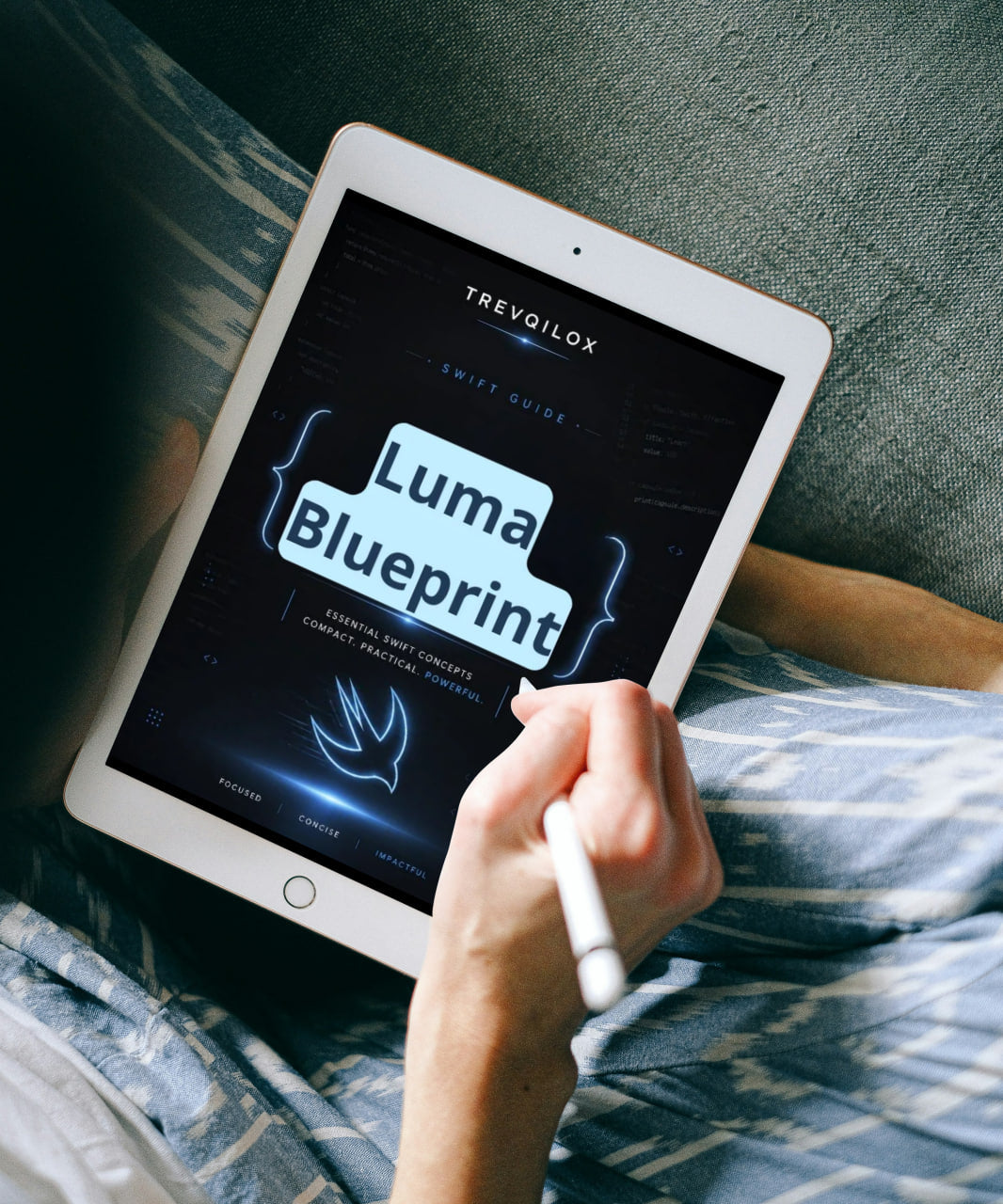 A person lying in bed uses a white tablet with a stylus to interact with the TrevoiloX Luma Blueprint app interface, which is displayed on the screen.