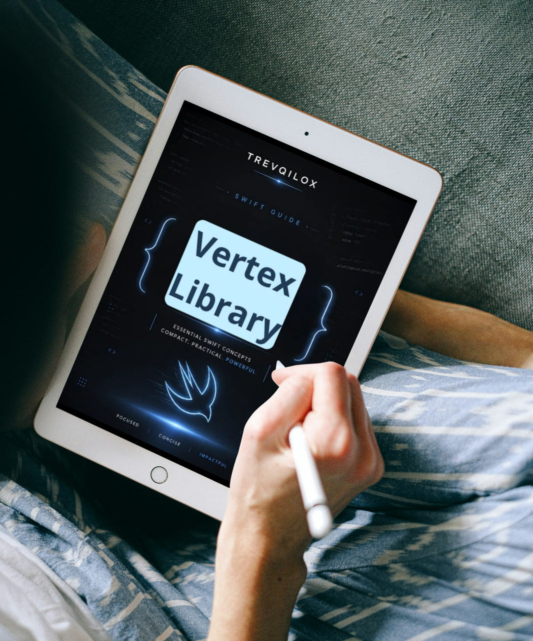 A person lying in bed holds a tablet with a stylus, showing the Trevoislox Swift Guide: Vertex Library screen.